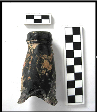 The mouth and neck of a dark green glass bottle, its lip thicker than the applied
                    ring below it.